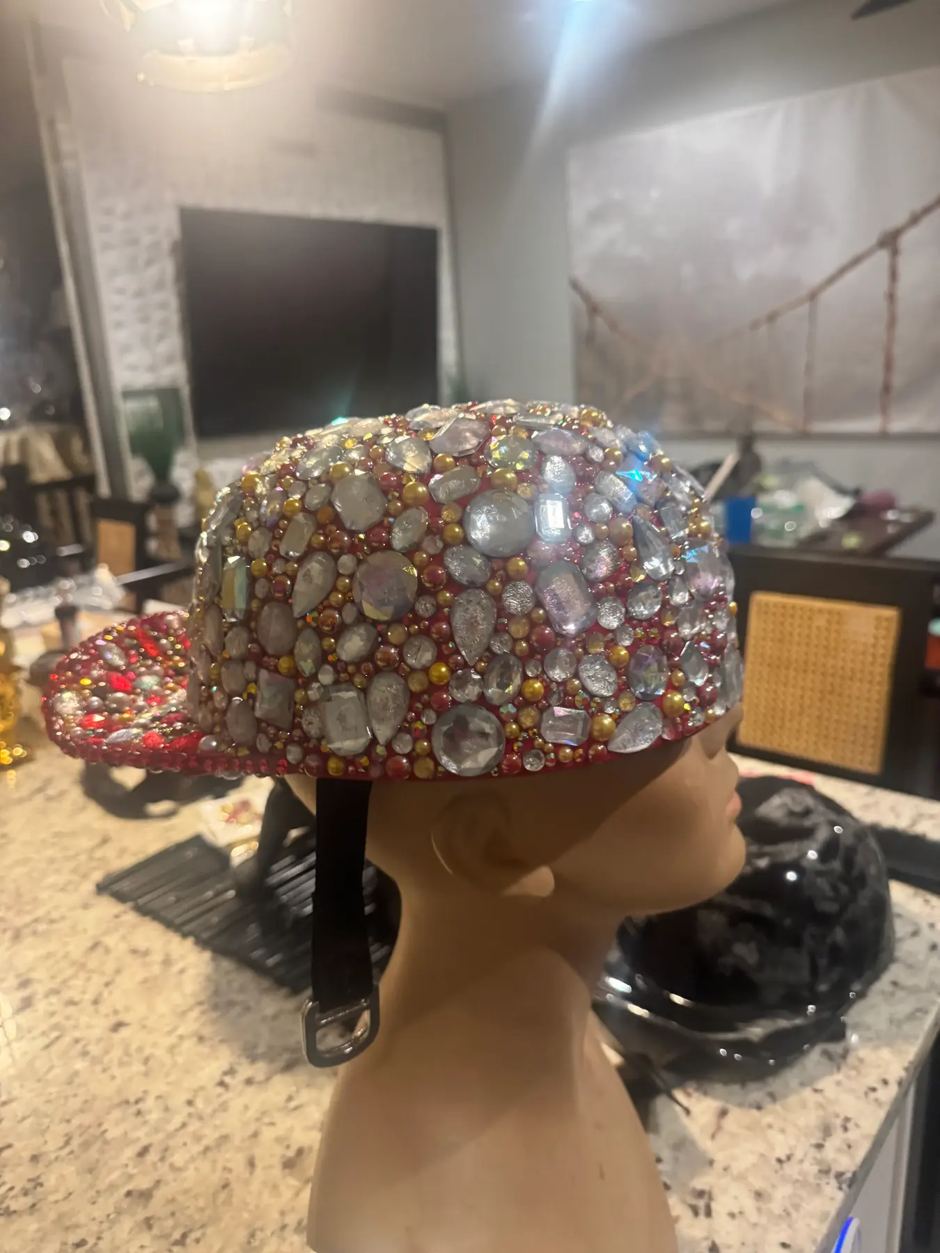 Back and side view of the red ball cap helmet