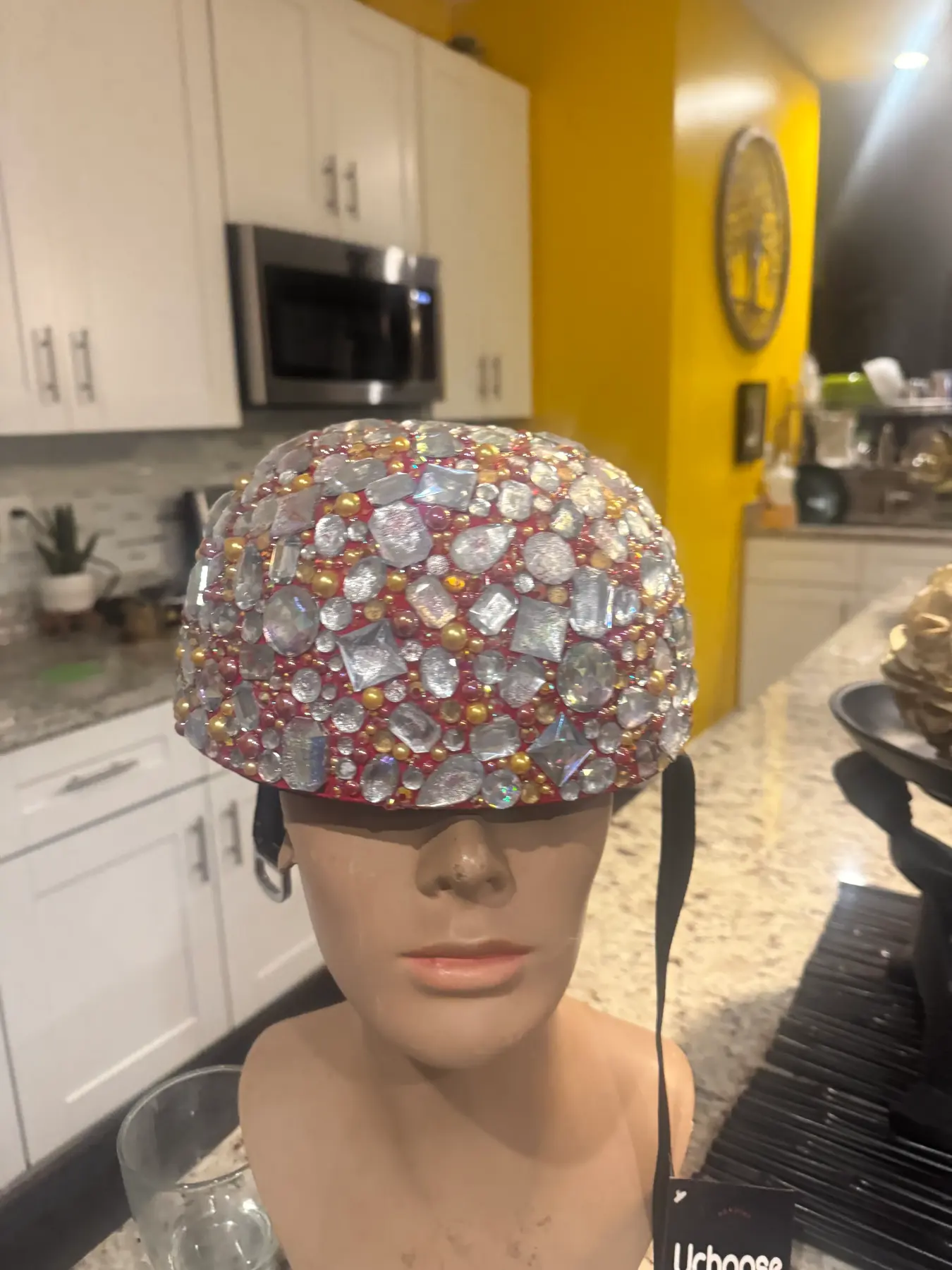 Front view of the red ball cap helmet